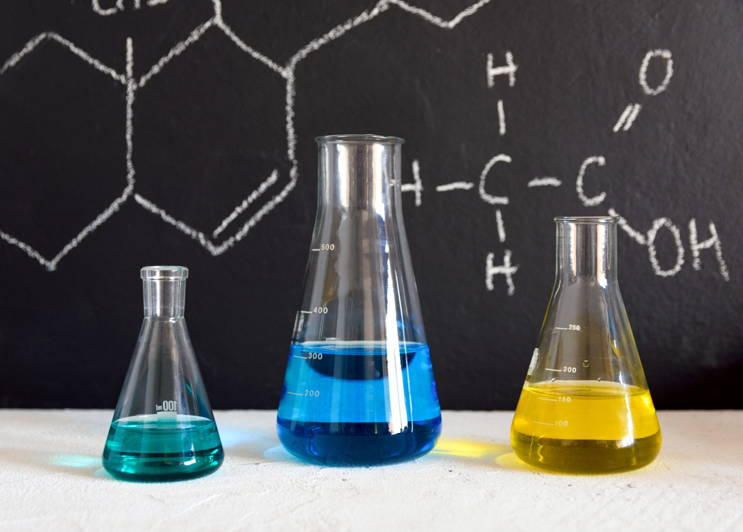 chemical-glassware-filled-with-colorful-fluids-in-2023-11-27-04-56-44-utc (1)